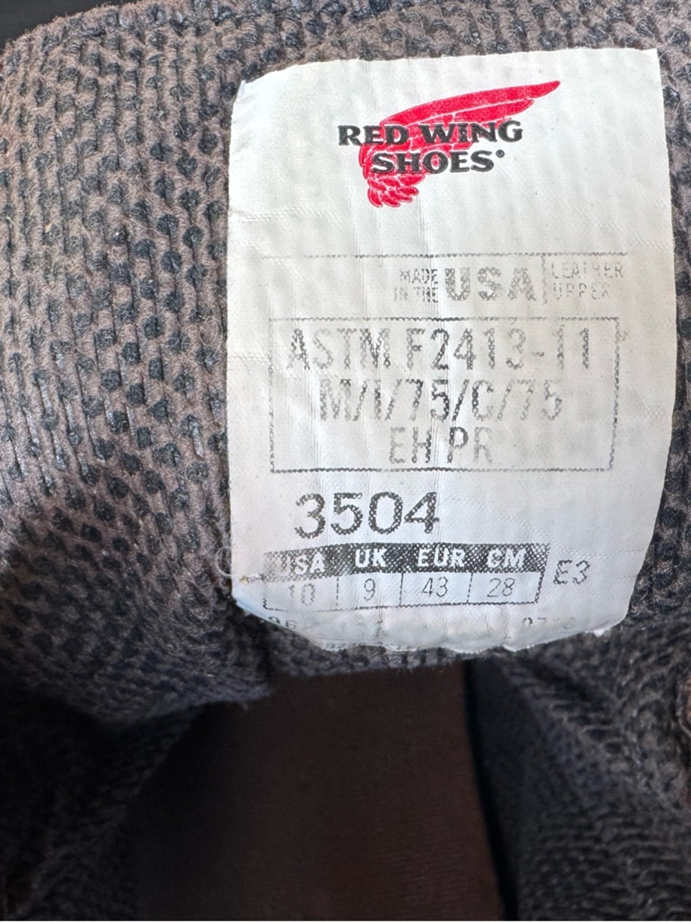 Red Wing Shoes label with red logo on gray lining